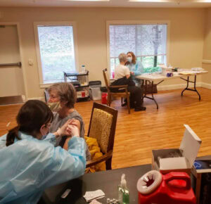 Residents receive COVID vaccine at Woodland Terrace