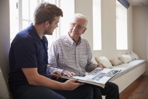 Looking at photos with man with memory loss