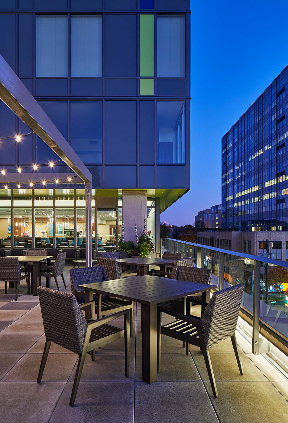 Outdoor Dining on Rooftop Deck - Murano Senior Living