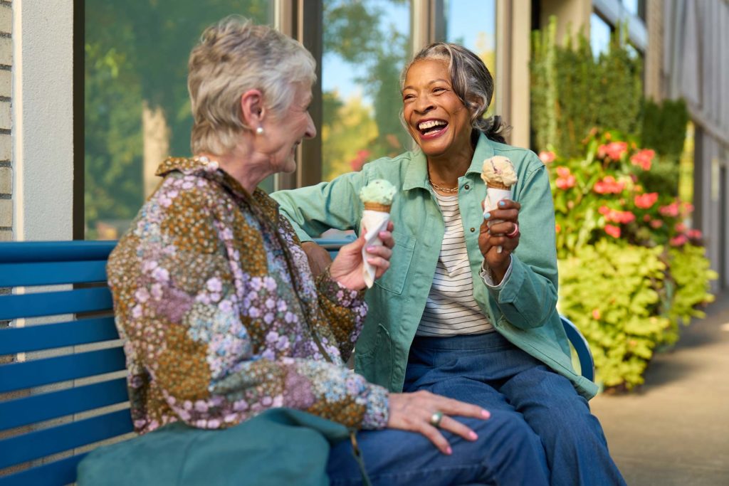Two women eating ice cream