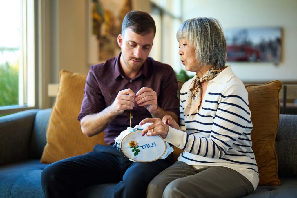 Woman learning to crochet