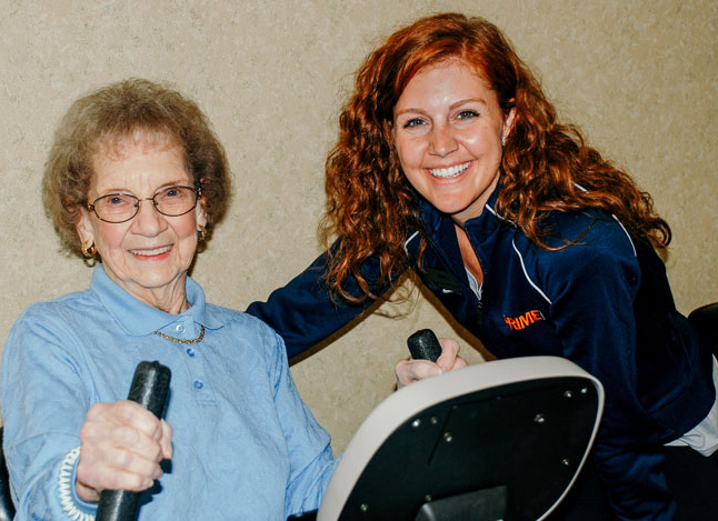 PrimeFit instructor with a resident