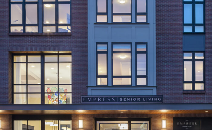 Empress Laurelhurst Ext Entrance Dusk Copyright Andrew Rugge Courtesy Perkins Eastman Web