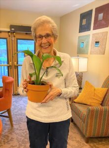 Canfield Place Resident with Plant