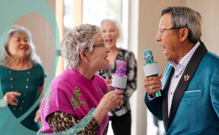 Older adults singing karoake