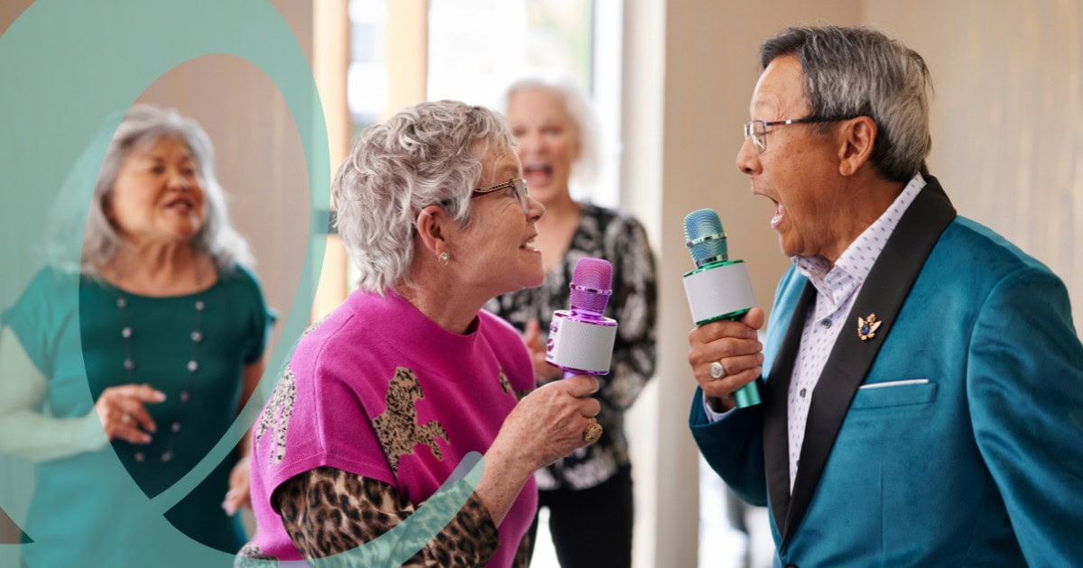 Older adults singing karoake