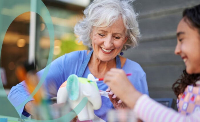 Older Woman Painting with Child